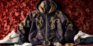 Luxus-Hoodie auf einem eleganten Hintergrund mit Zubehör.