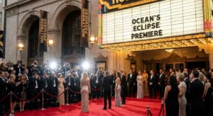 Dazzling lights and elegant gowns on the red carpet capturing Hollywood glamour